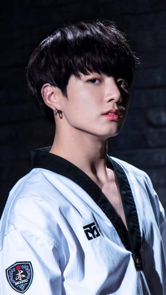 Jungkook playing martial arts.